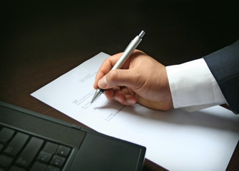 Business - Businessman signing a contract