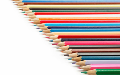 Colored pencils on a white background.