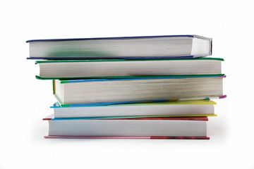 A stack of books on a white background.