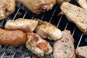 barbecue with delicious grilled meat on grill