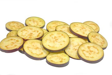 slices of eggplant fruit piled on hwite background