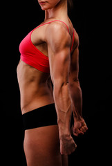 Fototapeta na wymiar Muscular strong woman