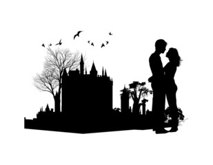 couple in love against the backdrop of an ancient castle