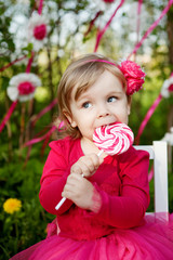 little girl with lollipop