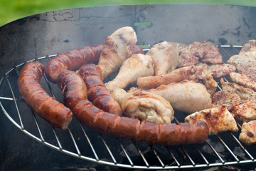 barbecue with delicious grilled meat on grill