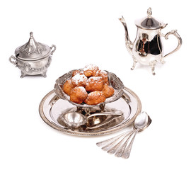 Delicious homemade fritters old antique silver metal container