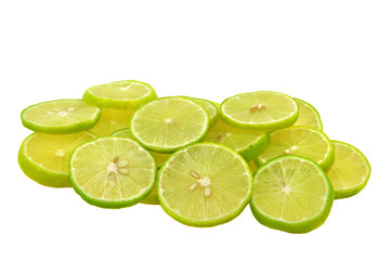 sliced pieces of lemon piled on white background