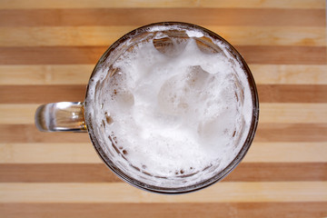 Glass with beer and foam