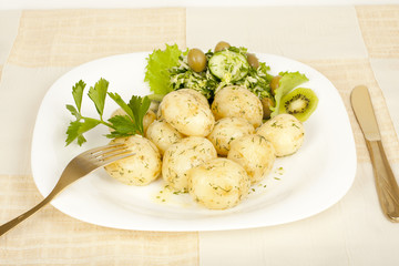 Early potatoes cooked with salad
