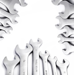Composition of wrenches on isolated white background