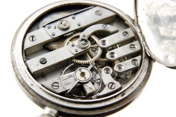 old silver pocket watch mechanism