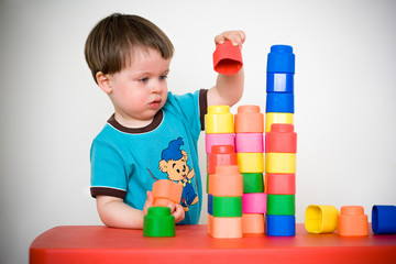 Two years child with colorful construction set