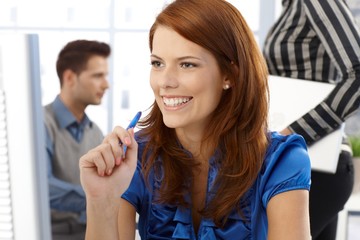 Fototapeta premium Laughing office worker woman