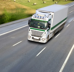 Truck on the road in motion