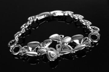 Beautiful silver bracelet with precious stones