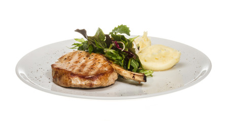 Grilled pork with salad and potato