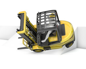 Yellow fork lift truck falling after turning on slope