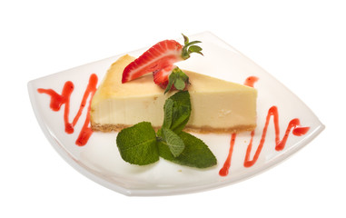 a piece of strawberry cheesecake on whit
