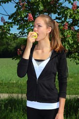 Fototapeta premium eating an apple
