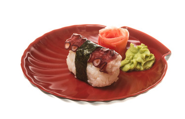 Japanese sushi with meat octopus on a white background