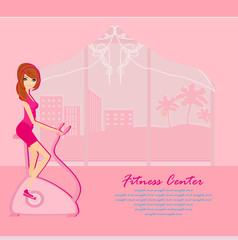 Girl on the exercise bike