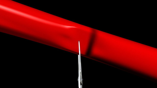 New opening. Cutting the ribbon with a scissors.