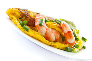 omelet with cooked shrimp and greens