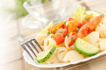 Pasta with vegetables on a plate