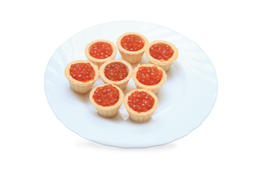 tartlet with red Caviar on white plate
