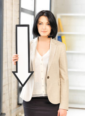 businesswoman with direction arrow sign