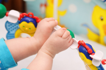 Baby feet in a bed