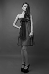 woman in a black dress.