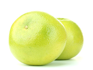 two green grapefruits isolated on white