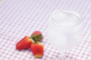 cocktail with ice and strawberry