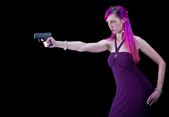 A woman aiming a gun