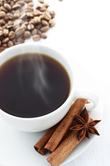 Cup of Hot Coffee with Cinnamon Sticks, Star Anise