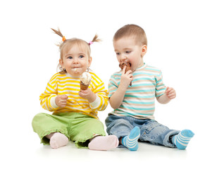 happy children little girl and boy with ice cream in studio isol