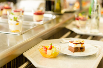 Desserts on serving tray cafeteria self service