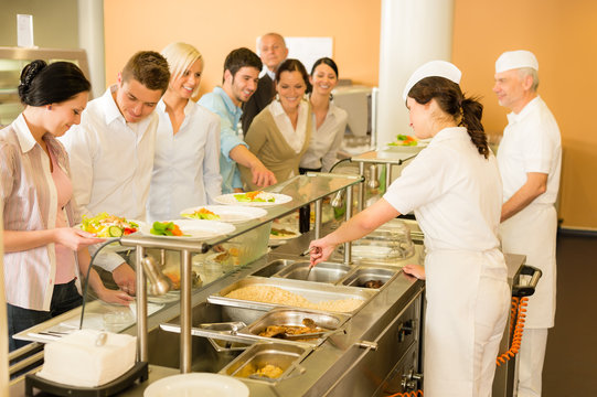 Office woman in canteen cook serve meals