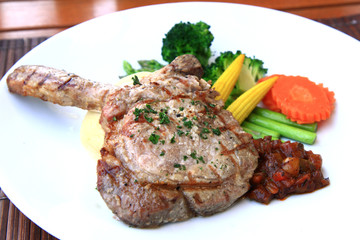 Grilled pork steak with vegetables