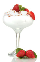 glass of ripe strawberries with cream isolated on white