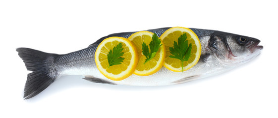 Fresh fish with lemon and parsley isolated on white.