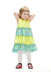 Cute little girl in colorful dress
