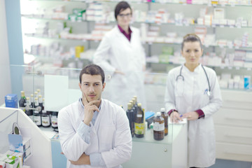 Obraz premium team of pharmacist chemist woman in pharmacy drugstore