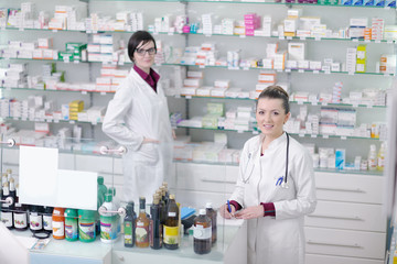 team of pharmacist chemist woman  in pharmacy drugstore