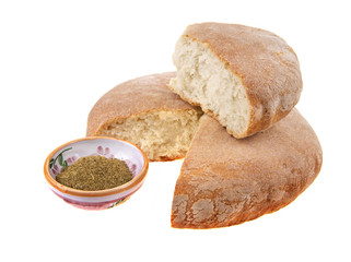 Round loaf of bread isolated on white
