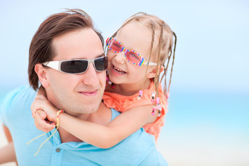 Father and daughter at beach