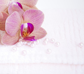 Naklejka na ściany i meble Orchids on Towel