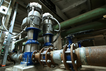 Equipment, cables and piping as found inside of  industrial powe