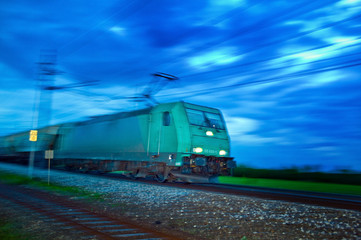 Fototapeta na wymiar Pociąg towarowy w nocy. Night Train